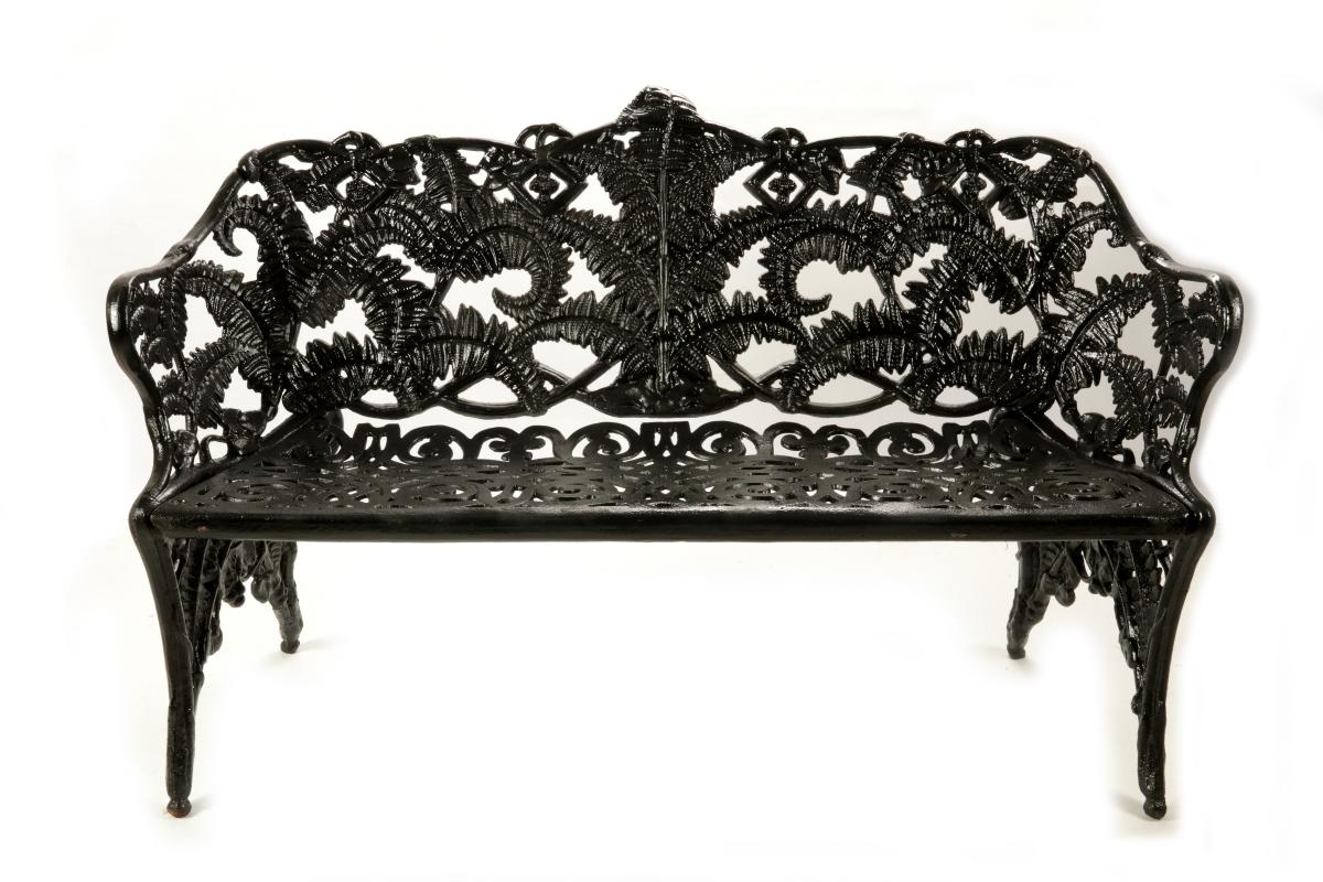 A VICTORIAN FERN PATTERN CAST IRON GARDEN BENCH