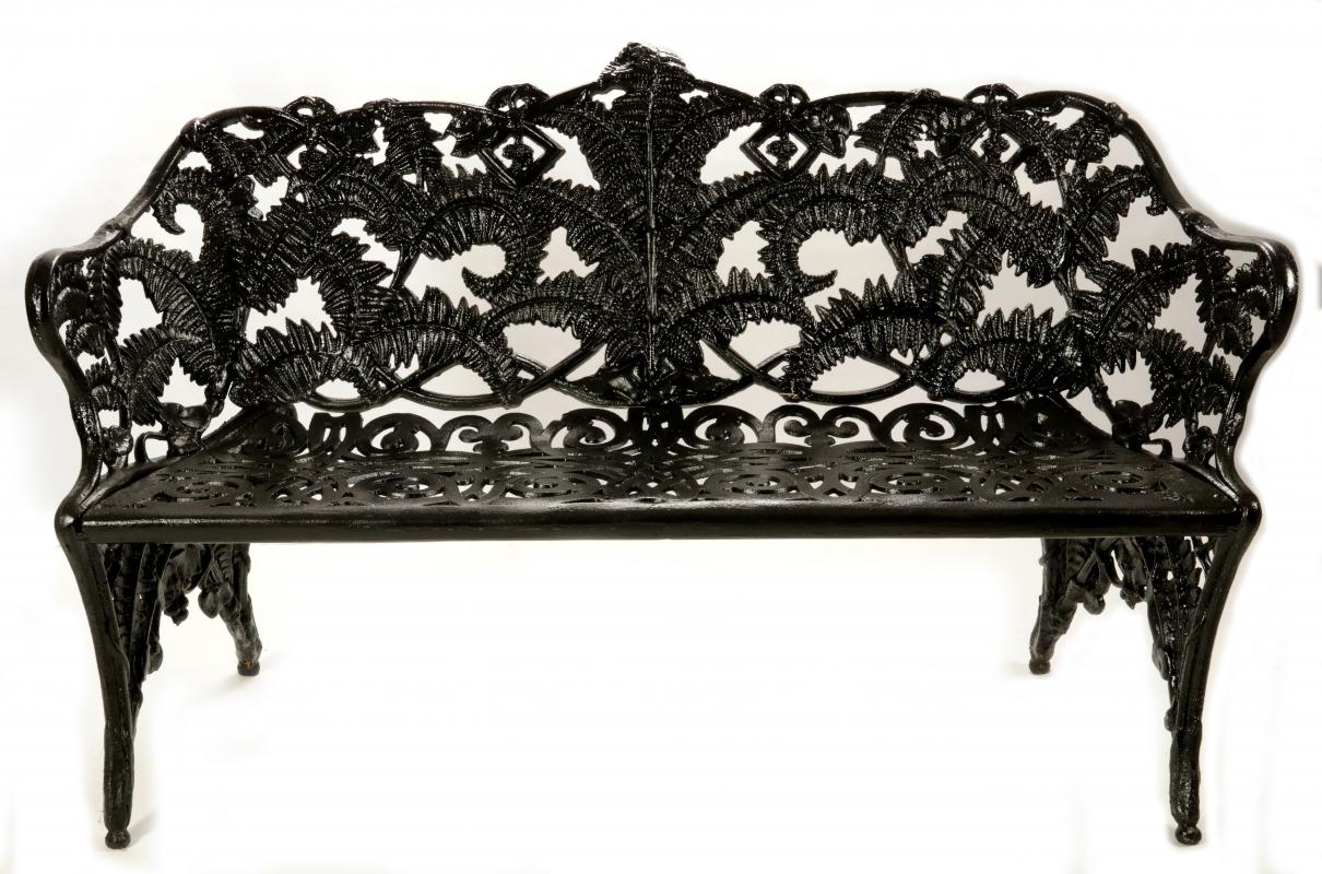 A VICTORIAN FERN PATTERN CAST IRON GARDEN BENCH 