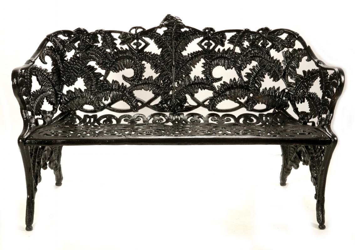 A FERN PATTERN CAST IRON GARDEN BENCH