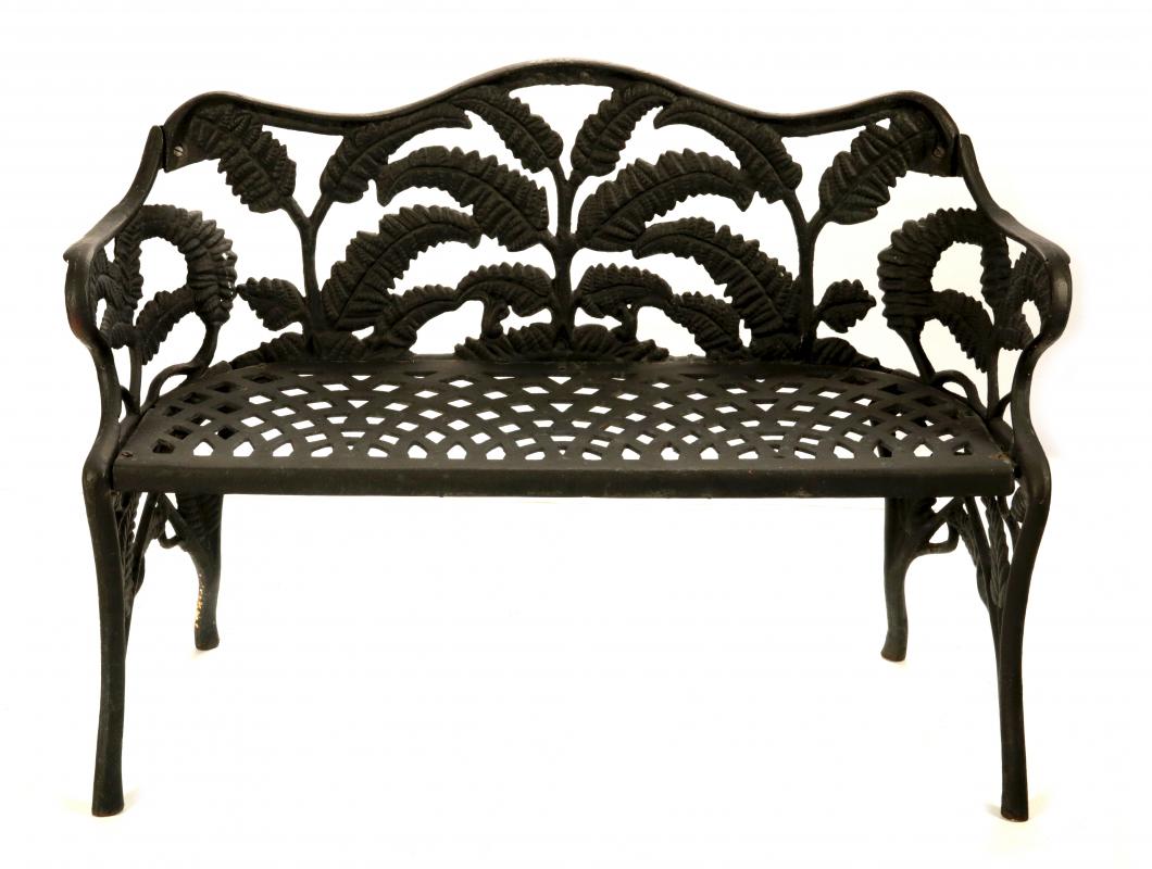 A FERN PATTERN CAST IRON BENCH 