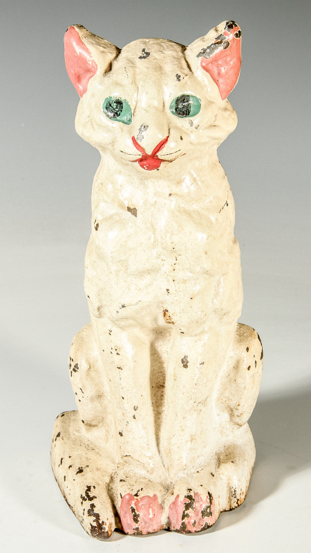 A VINTAGE SITTING CAT CAST IRON DOOR STOP