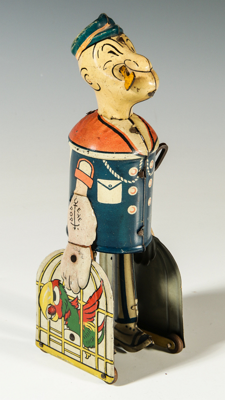 A CIRCA 1935 POPEYE TIN LITHO WIND UP WALKER TOY