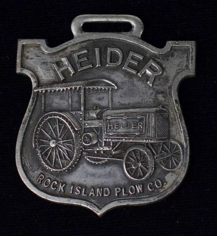 HEIDER ROCK ISLAND PLOW CO. ADVERTISING WATCH FOB