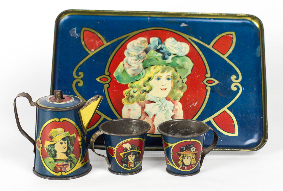 A CHILD'S TIN LITHO TEA SET FOR TWO