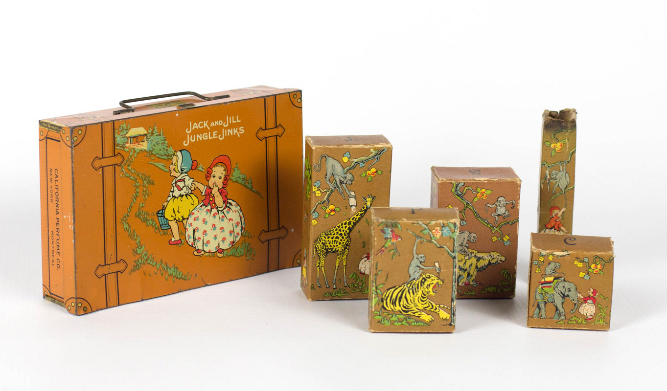 CALIFORNIA PERFUME 'JUNGLE JINKS' TIN AND CONTENTS