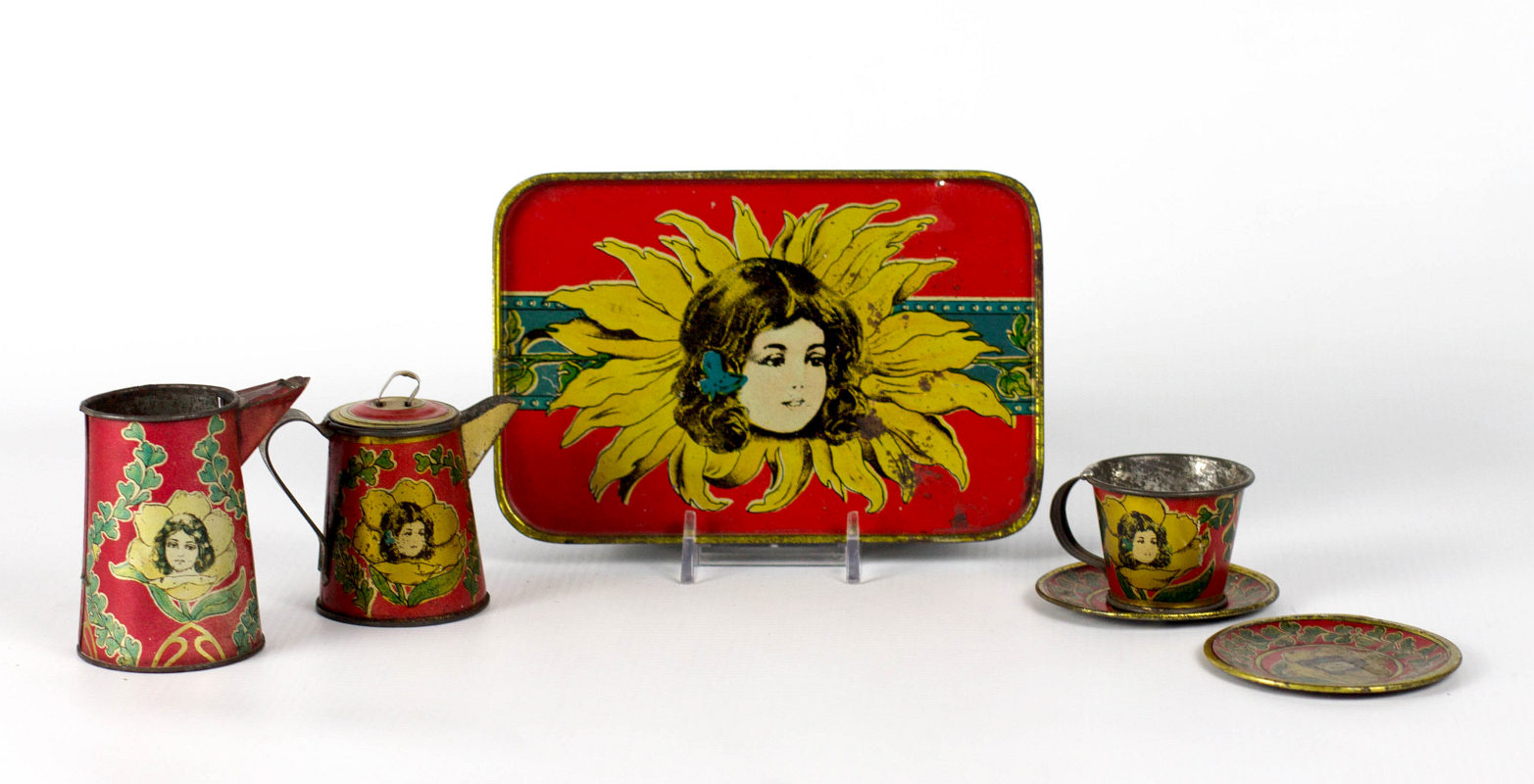 A CHILD'S TIN LITHO TEA SET