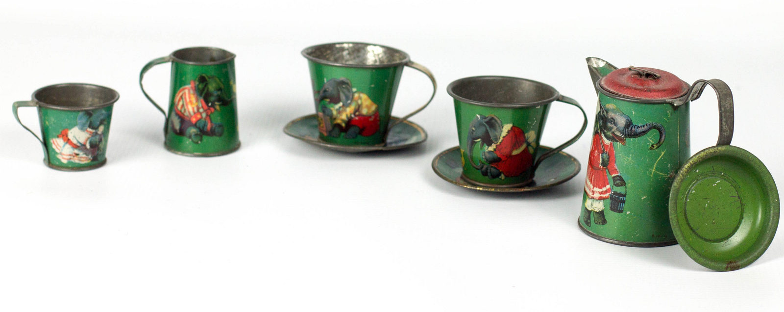 A CHILD'S TIN LITHO TEA SET WITH ELEPHANTS