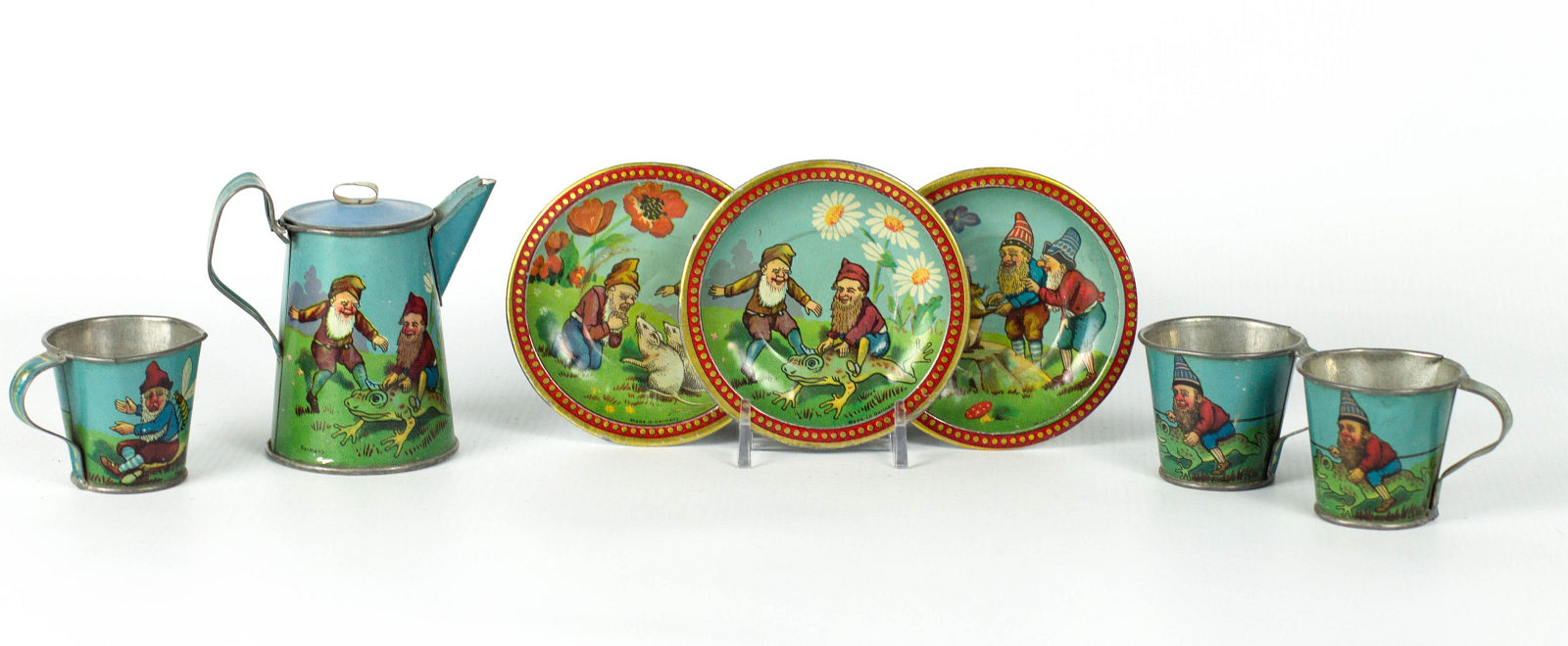 A CHILD'S TIN LITHO TEA SET w/ GNOMES