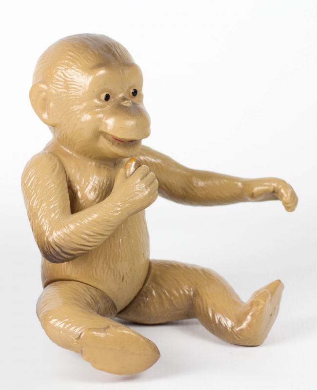 AN ARTICULATED CELLULOID CHIMPANZEE FIGURE