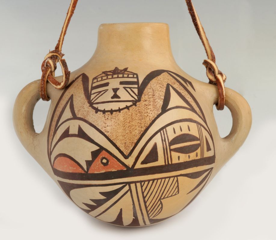 A HOPI POTTERY CANTEEN WITH KACHINA HEAD 