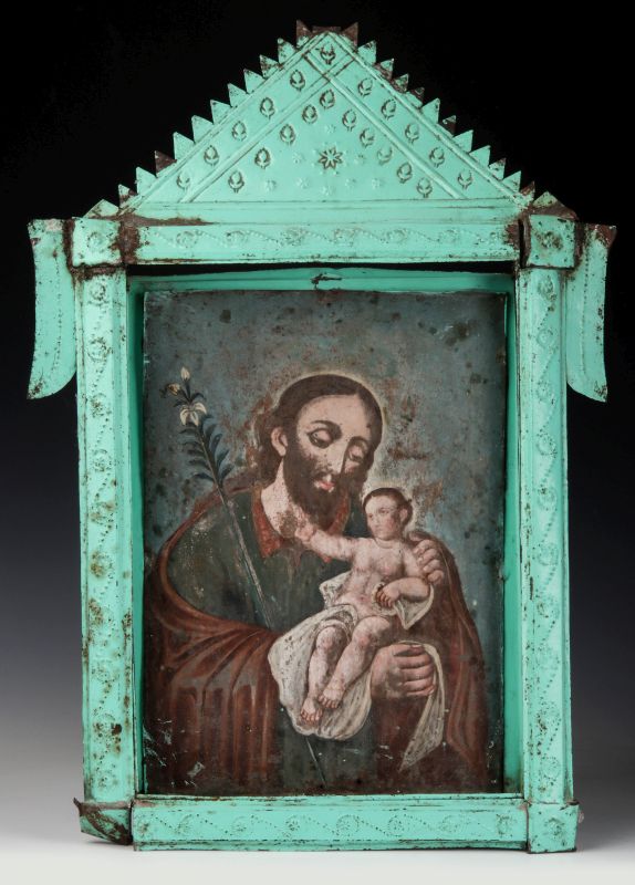 AN EARLY 19TH C. SPANISH COLONIAL RETABLO IN TIN NICHO