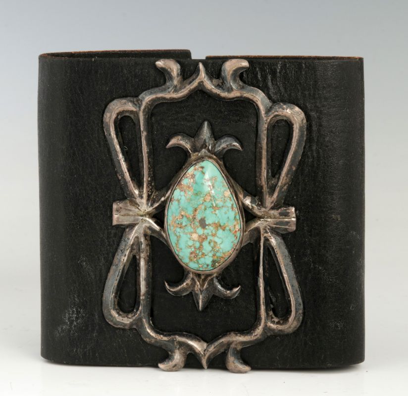 A TUFA CAST NAVAJO STERLING AND TURQUOISE KETOH