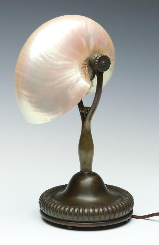 A CIRCA 1904 TIFFANY NAUTILUS SHELL READING LAMP