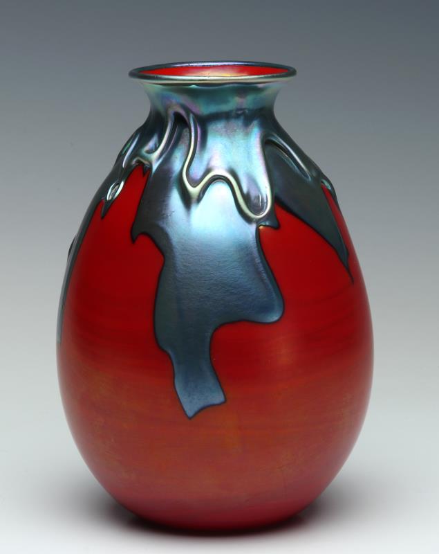 A CHARLES LOTTON MANDARIN RED LAVA CYPRIOT VASE