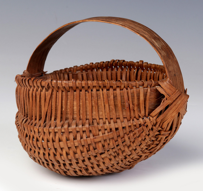 A 19TH CENTURY AMERICAN MINIATURE BUTTOCKS BASKET