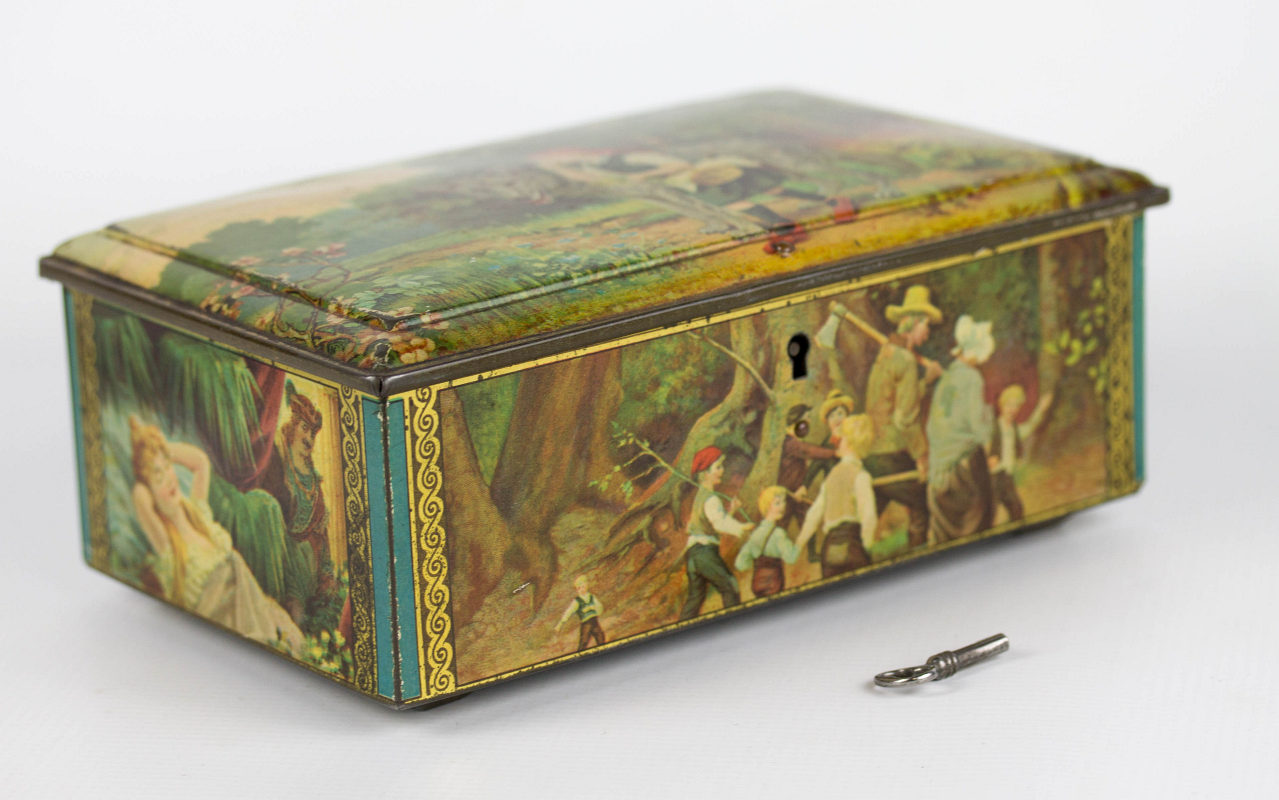 A TIN LITHO LOCK BOX WITH FAIRY TALE SCENES