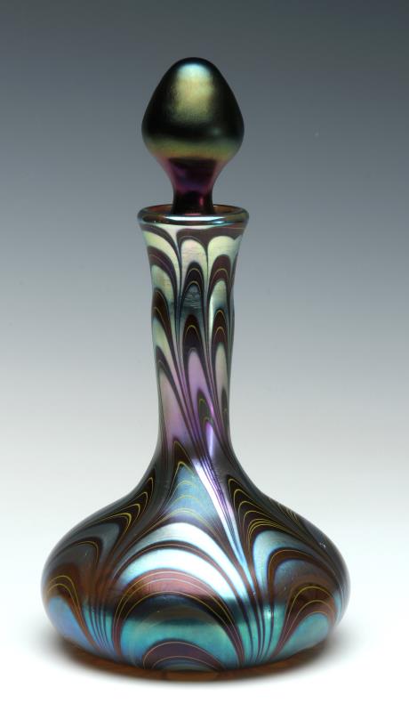 A LUNDBERG STUDIOS ART GLASS BOTTLE DATED 1977