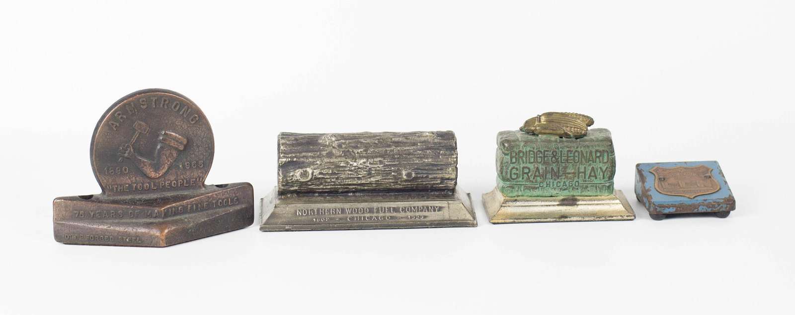 FOUR CHICAGO RELATED ADVERTISING PAPERWEIGHTS