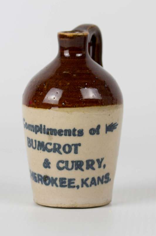 BUMCROT & CURRY CHEROKEE, KANSAS ADVTG MINI JUG