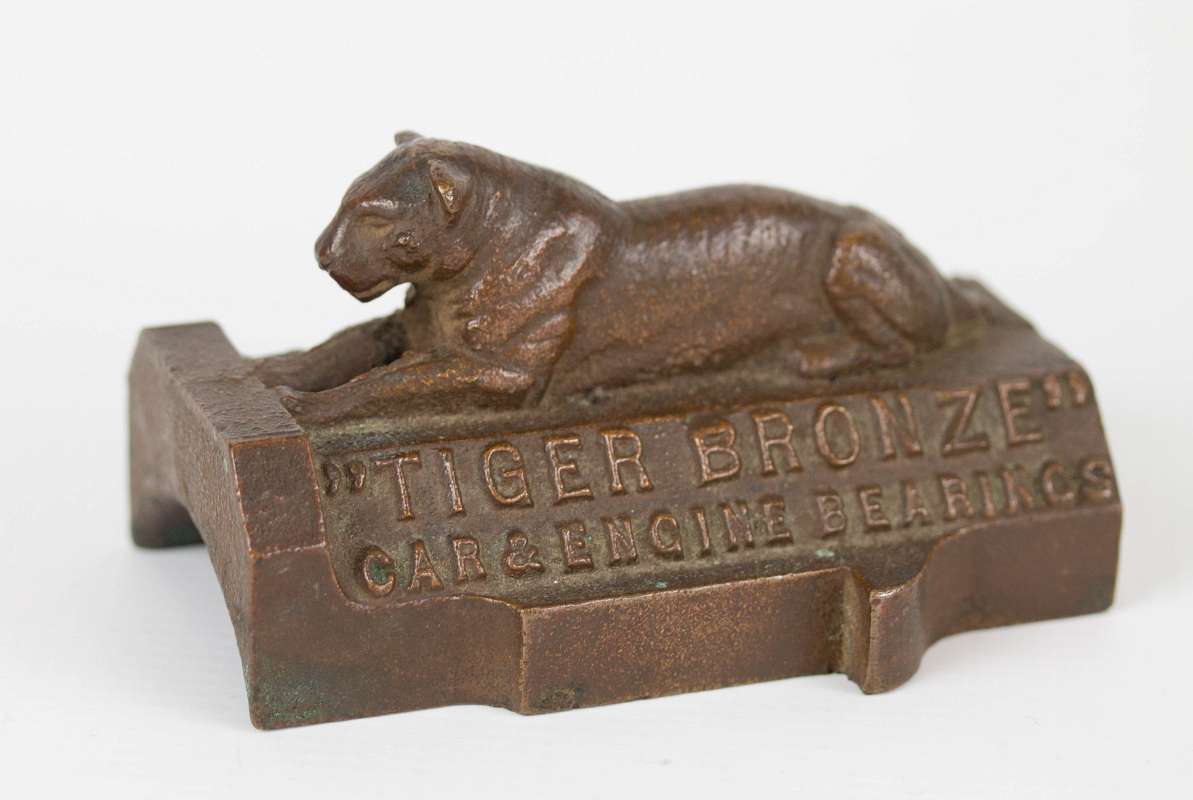  'TIGER BRONZE' AUTO BEARINGS ADVTG PAPERWEIGHT 