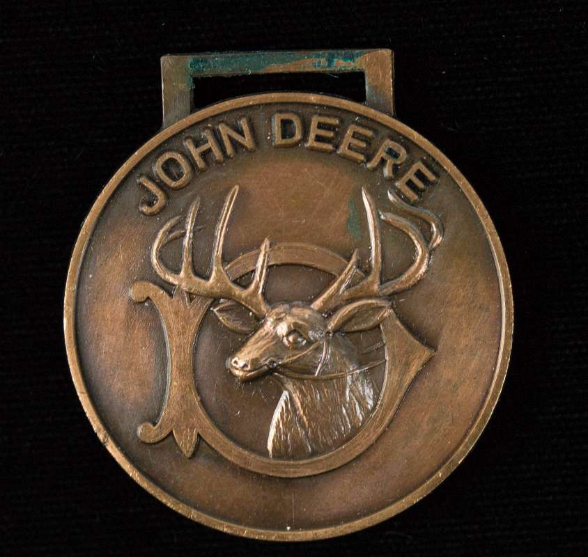 AN EARLY JOHN DEERE COMPANY ADVERTISING WATCH FOB