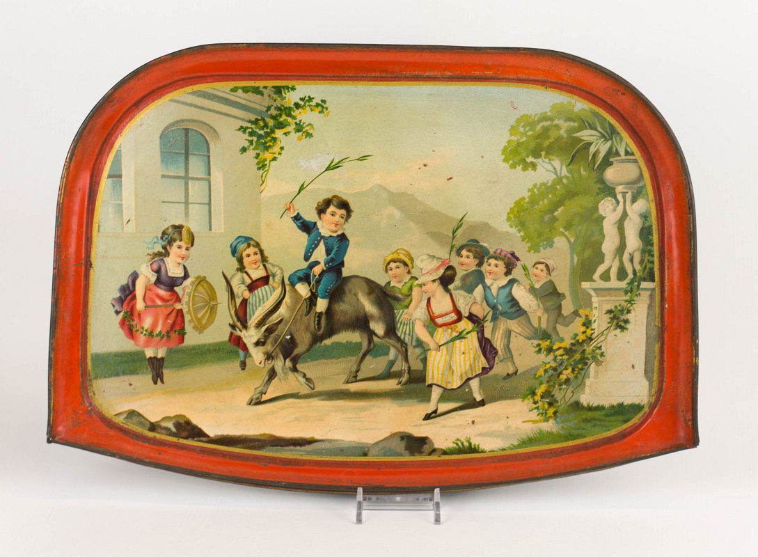 A TIN LITHO HIGH CHAIR TRAY