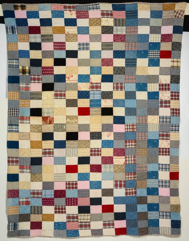 A VINTAGE SCRAPPY QUILT