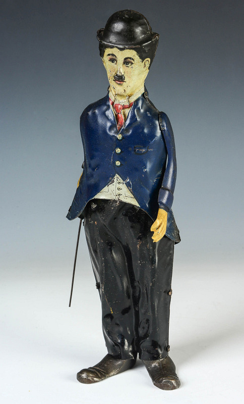 A CIRCA 1915 CHARLIE CHAPLIN TIN W/UP WALKER TOY 