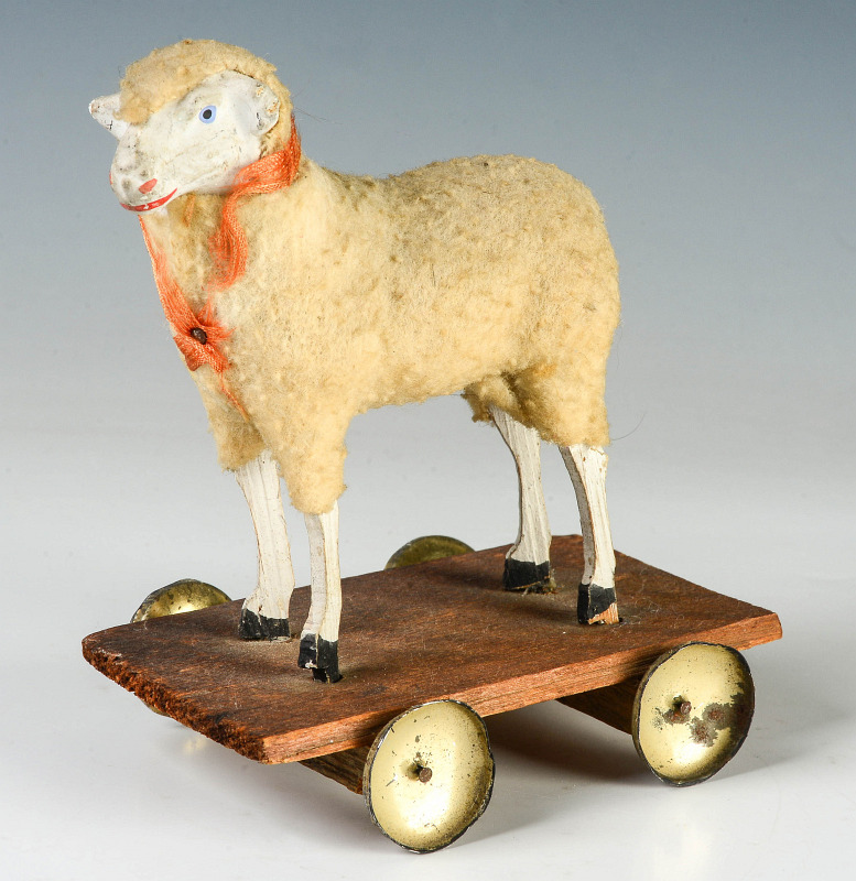 FELTED GERMAN COMPOSITION SHEEP ON WHEEL PLATFORM