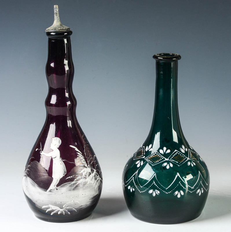 TWO CIRCA 1890 ENAMELED GLASS BARBER BOTTLES