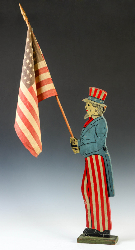 AN EARLY 20TH C. FOLK ART UNCLE SAM FLAG HOLDER