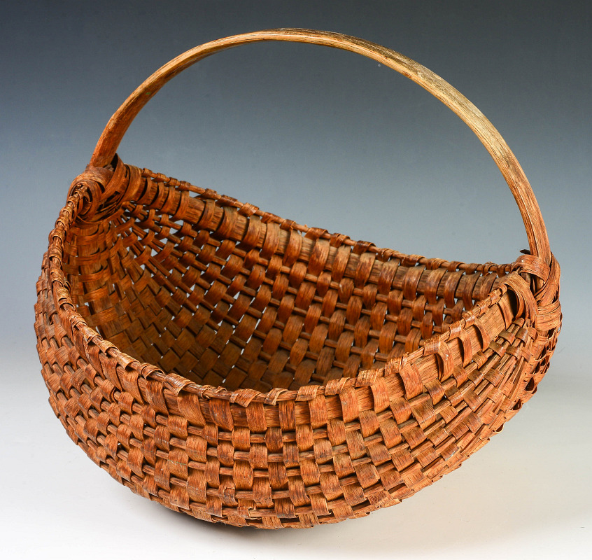 A 19TH C. AMERICAN HALF BUTTOCKS BASKET