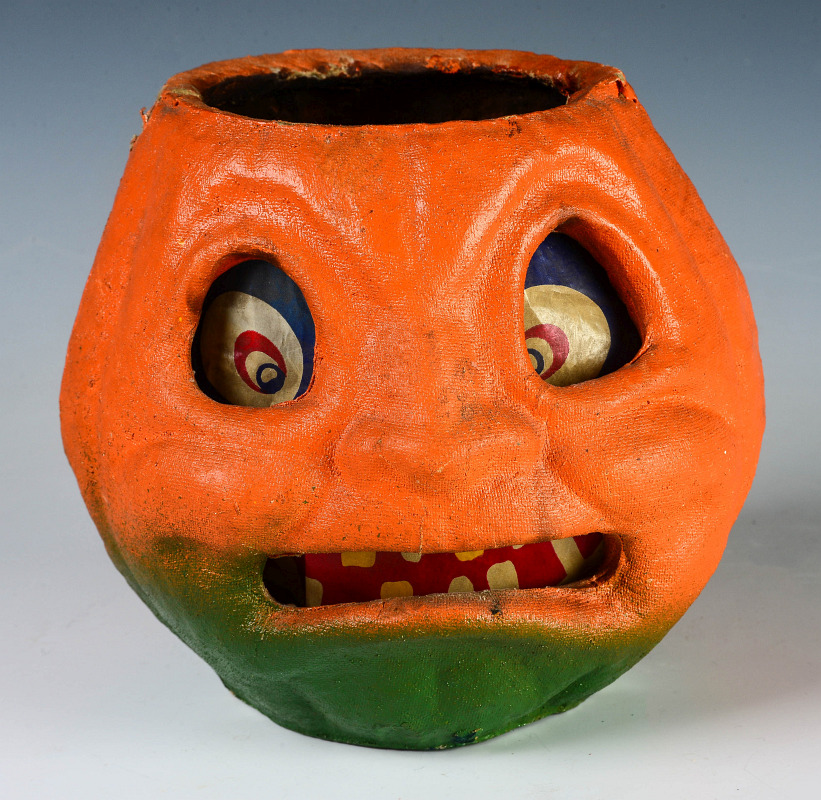 A VINTAGE PRESSED PAPER HALLOWEEN JACK-O-LANTERN