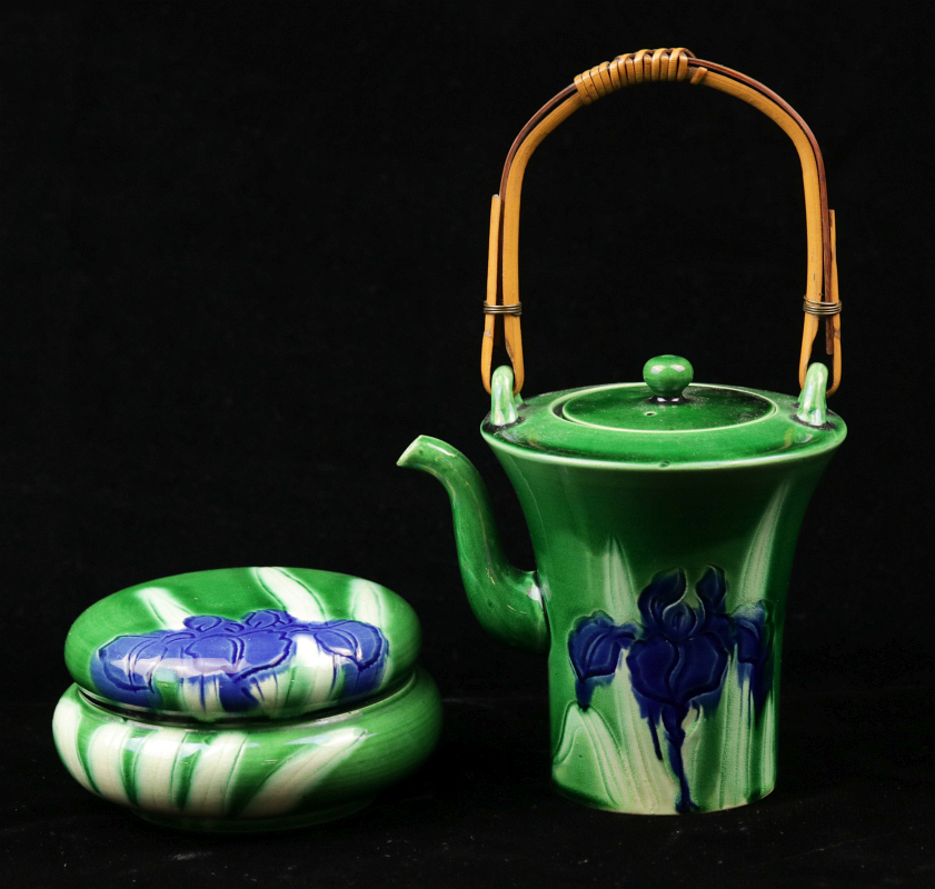 A JAPANESE AWAJI POTTERY WITH CARVED IRIS