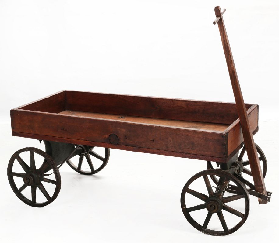 A CIRCA 1900 WOOD COASTER WAGON