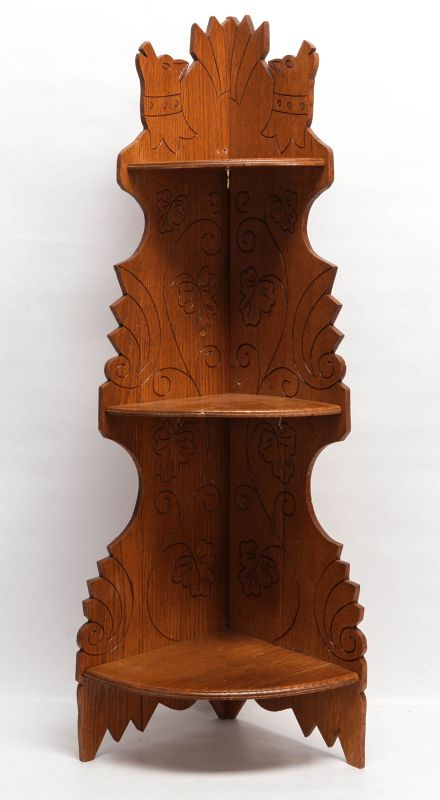 AN EASTLAKE STYLE SCROLL CUT OAK CORNER SHELF 