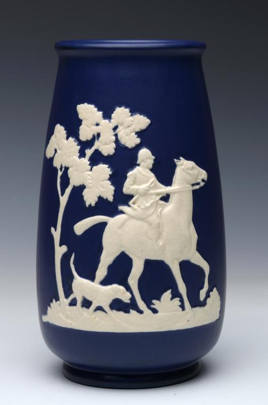 A WELLER 'CHASE' PATTERN ART POTTERY VASE