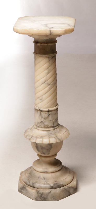 A CARVED WHITE MARBLE PEDESTAL CIRCA 1920