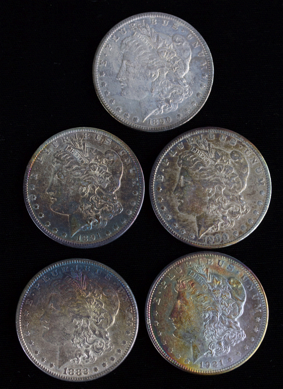 FIVE MORGAN SILVER DOLLARS