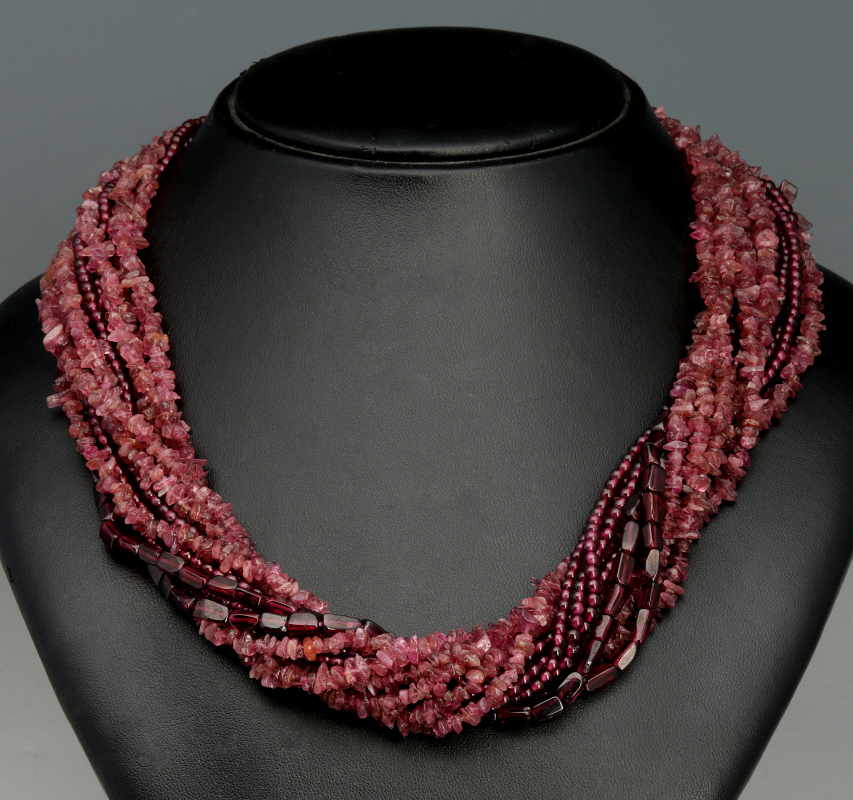 A MULTI-STRAND GARNET AND PINK TOURMALINE NECKLACE