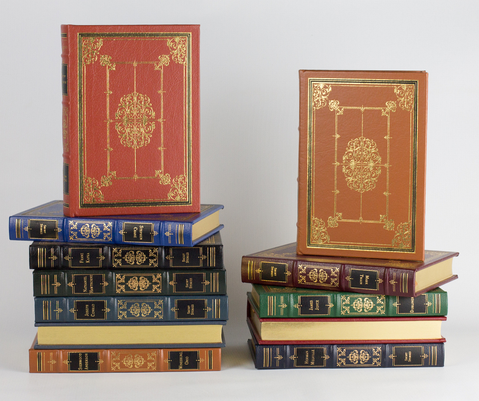 TWELVE EASTON PRESS VOLUMES BY CONRAD, TWAIN, ETC.