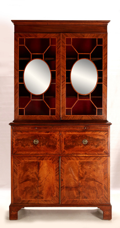 AN UNUSUAL FLAME MAHOGANY GEORGIAN BUREAU BOOKCASE