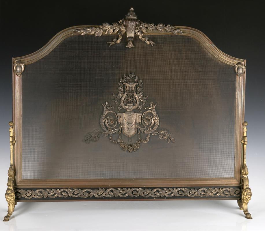 A 19TH CENTURY FRENCH BRASS OR BRONZE FIRE SCREEN