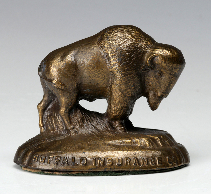 BUFFALO INSURANCE FIGURAL PAPERWEIGHT CIRCA 1940