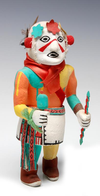 A 20TH CENTURY CARVED COTTONWOOD HO-E KACHINA