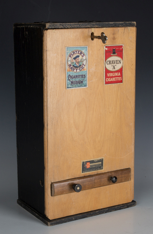 A BRITISH MID 20TH CENTURY CIGARETTE DISPENSER