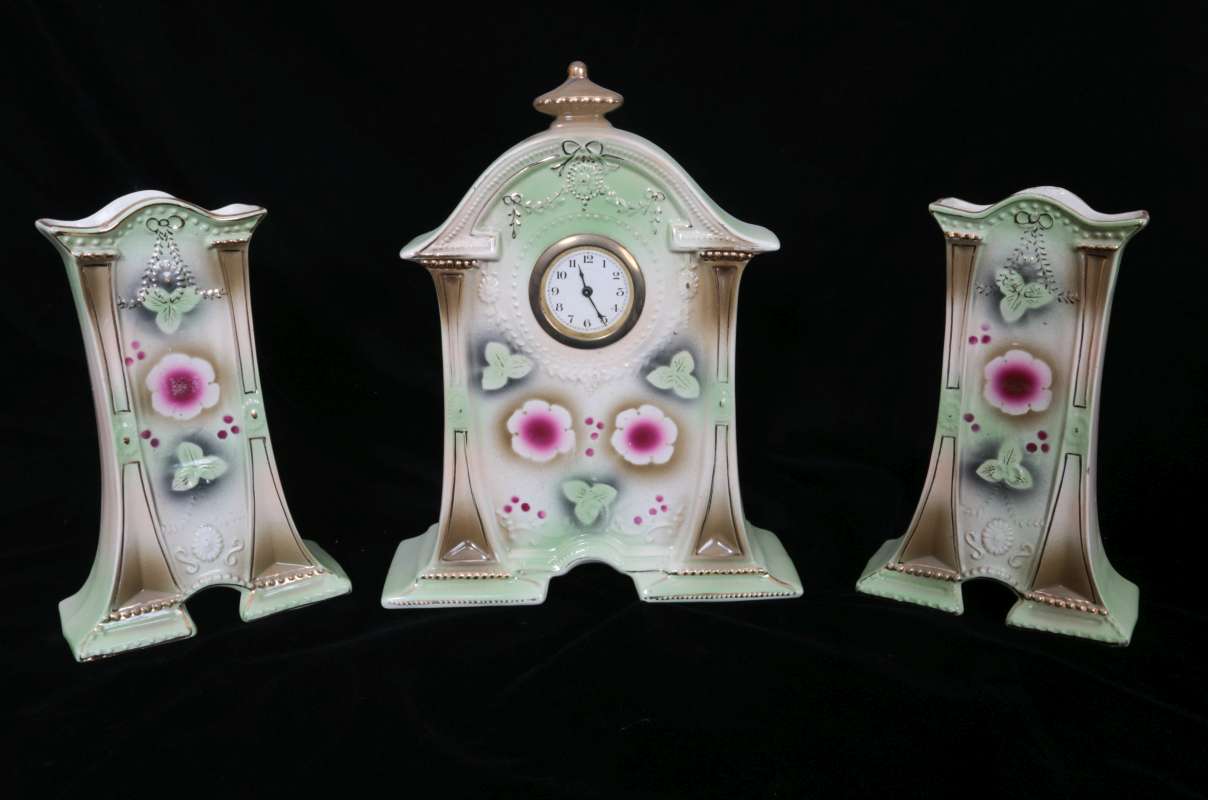 AN EARLY 20TH C. ENGLISH CHINA CLOCK SET