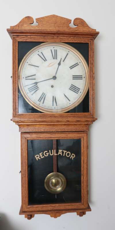 AN INGRAHAM OAK BOX REGULATOR CIRCA 1900