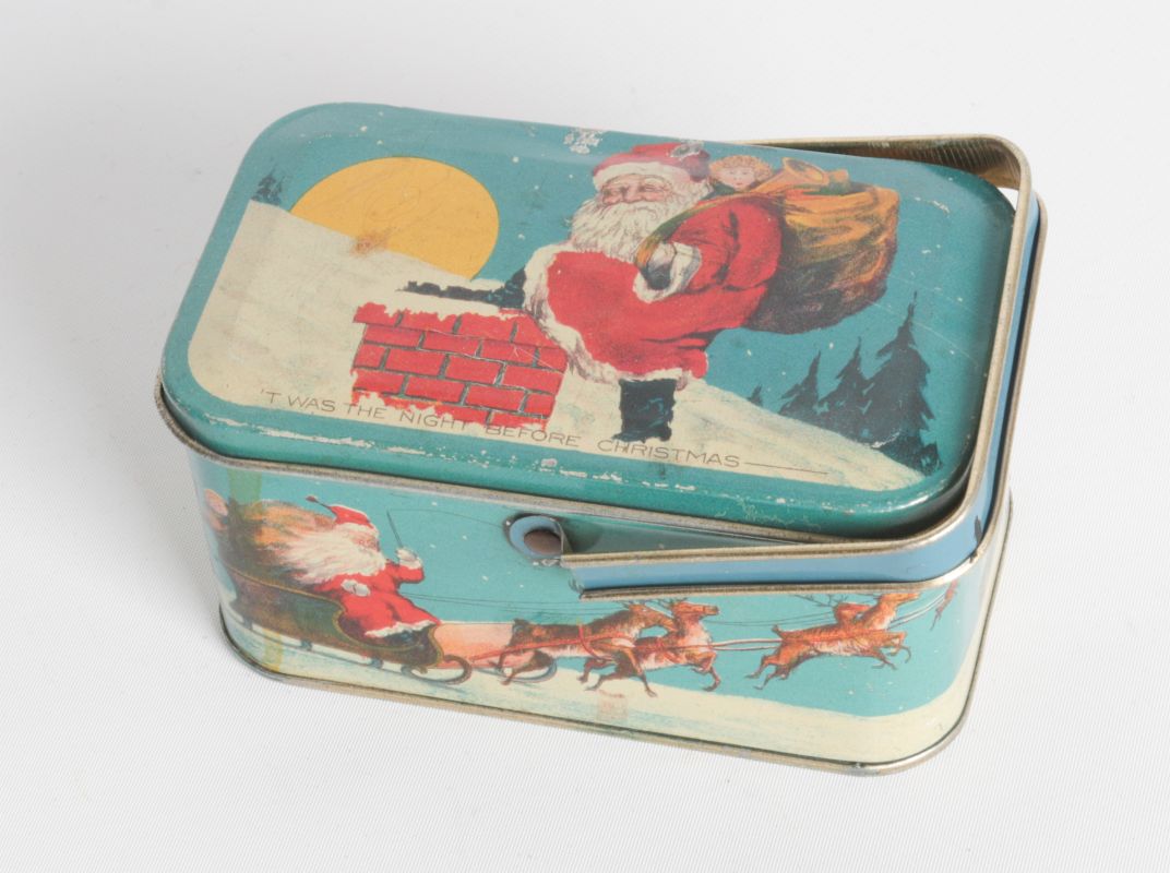 A TIN LITHO SANTA CLAUS BISCUIT TIN CIRCA 1920