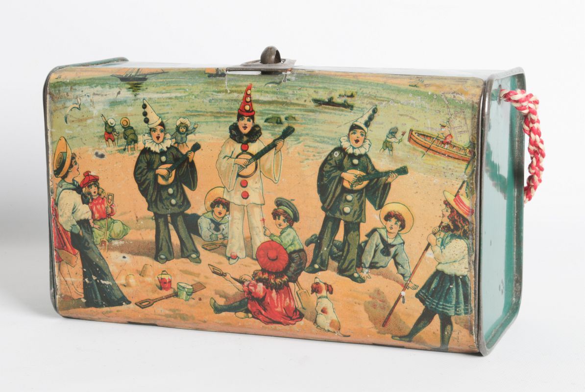 A CIRCA 1910 TIN LITHO LUNCH BOX W/ BEACH SCENE